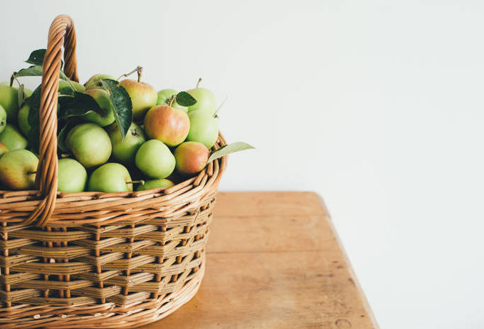basket of green apples