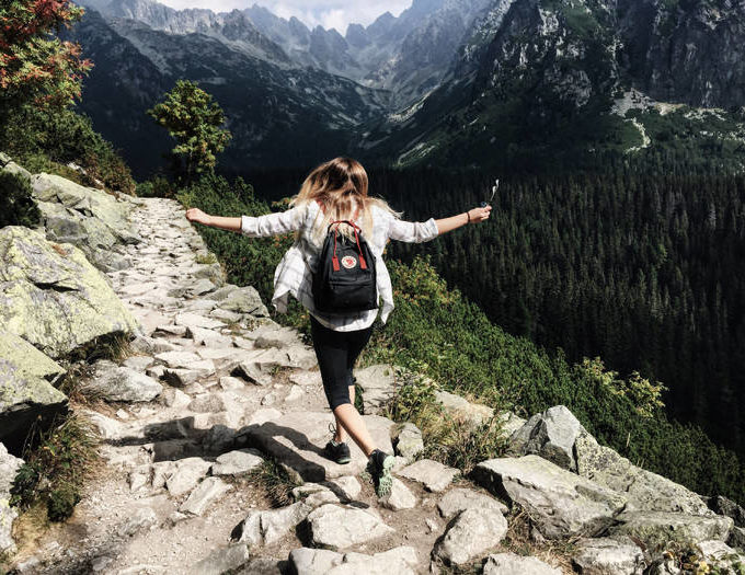 A woman hiking.
